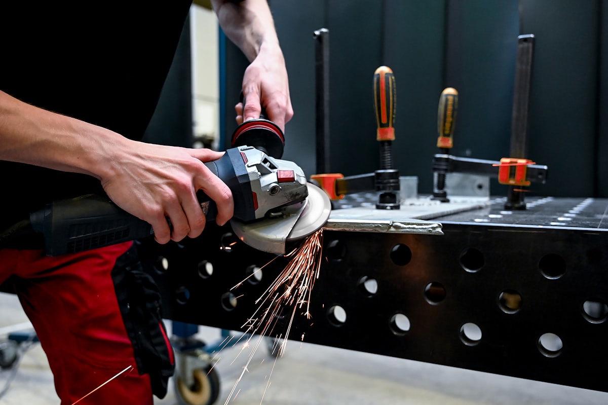 Apprentice working on precision metalwork