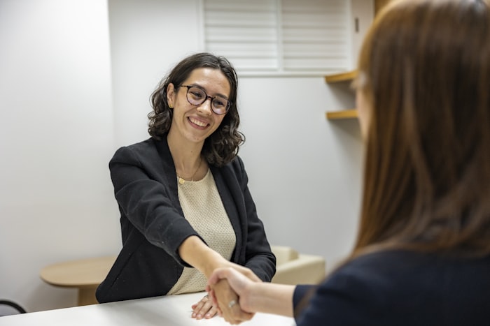 Candidate shaking hands after a successful interview